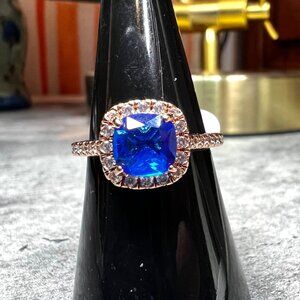 Ring Bomb Party Ring, NWOT, size 7, blue stone, rose gold color band